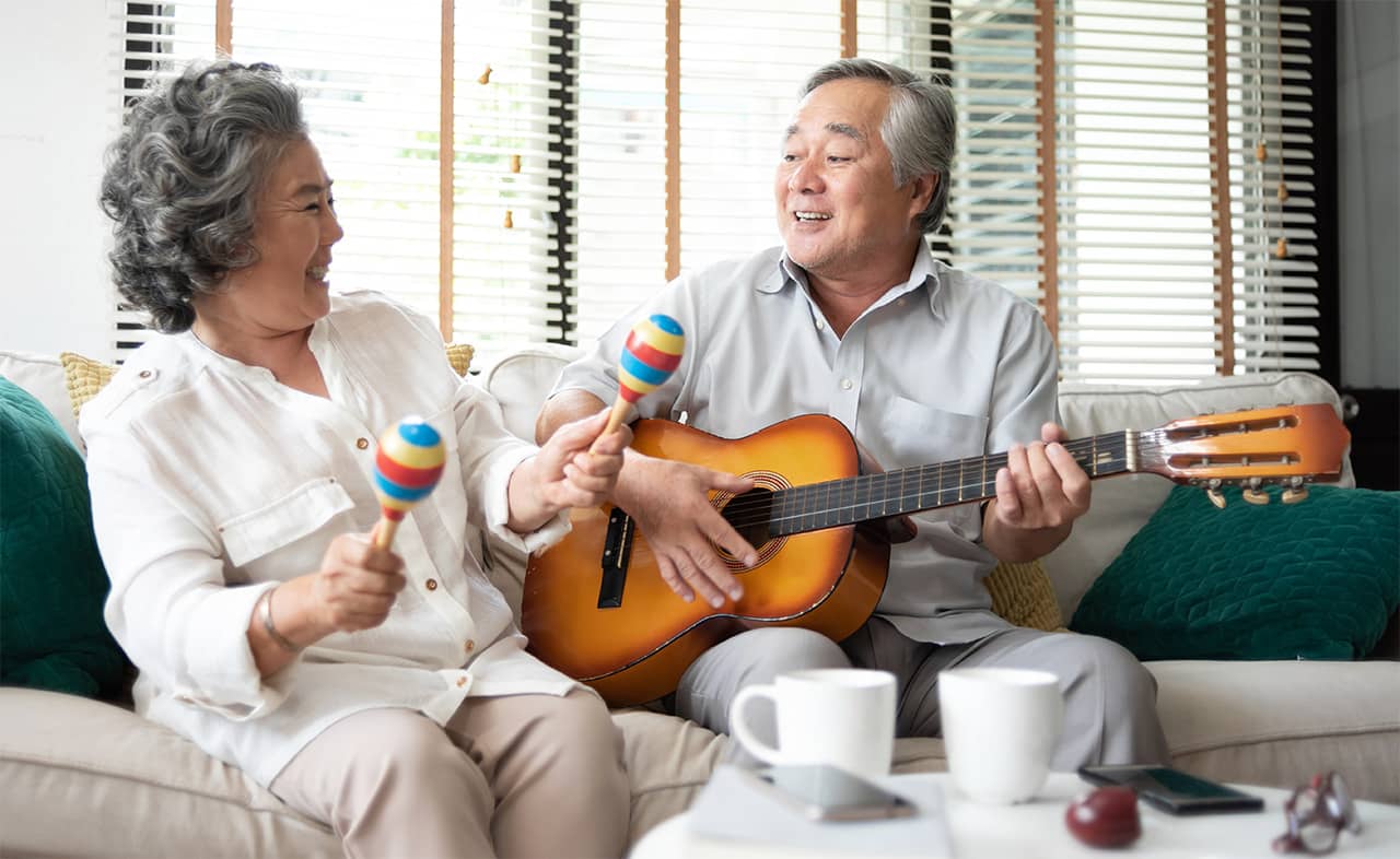 Senior Couple Playing Music